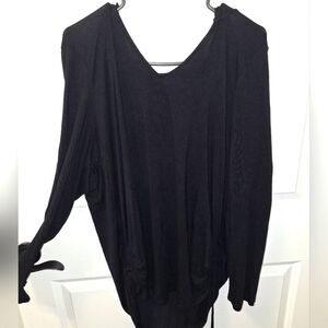 A Torrid Super Soft double v-neck long sleeve hooded top in a size 2 (2XL).